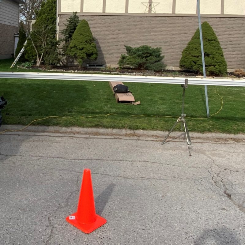 custom seamless eavestrough created on site with special machine on back of truck