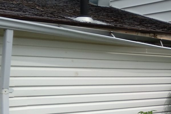 fascia board rot repair required for water damage and hanging gutters